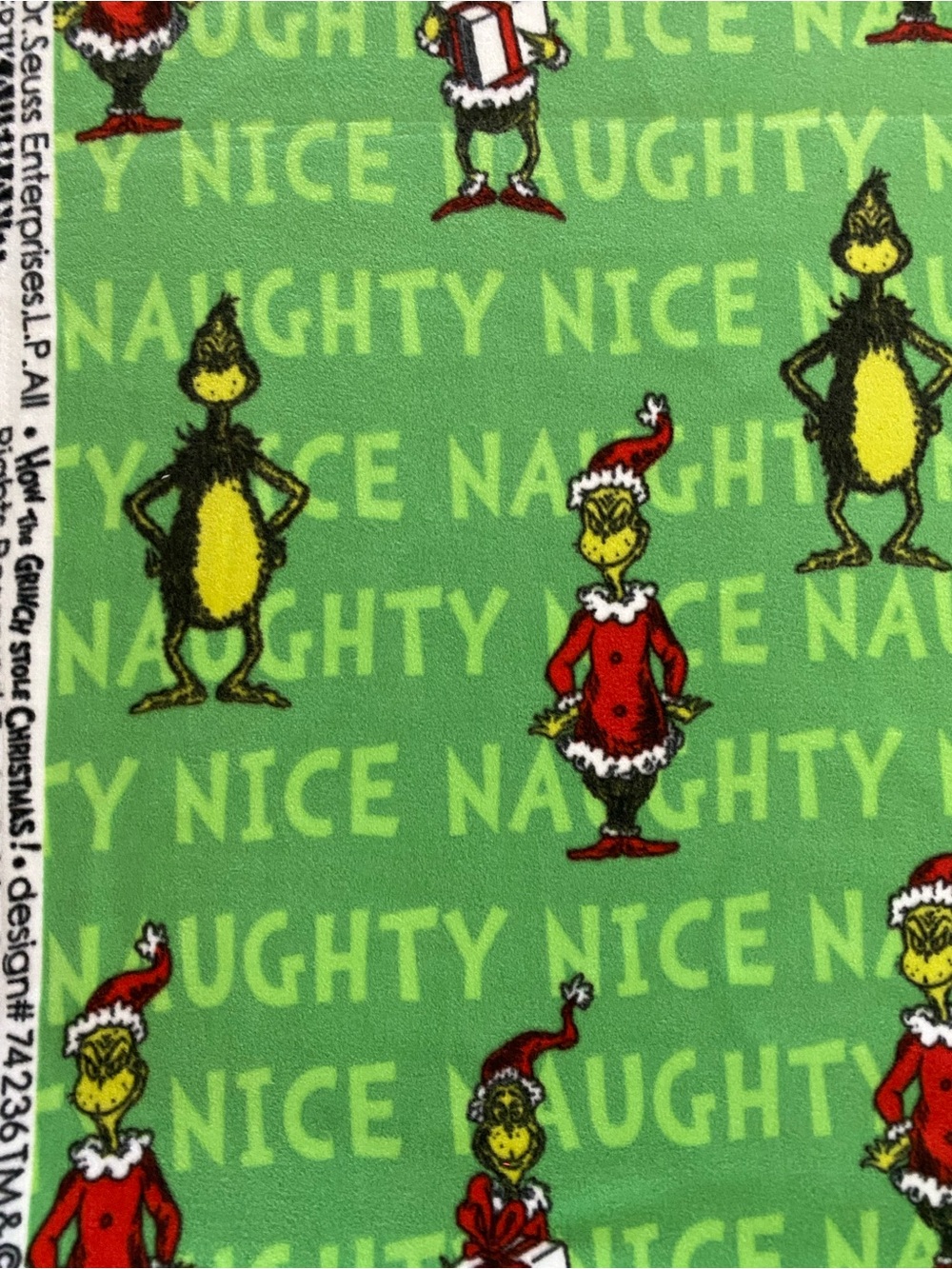 58” Wide “How The Grinch Stole Christmas“ Robert Kaufman Naughty Nice Fleece BTY